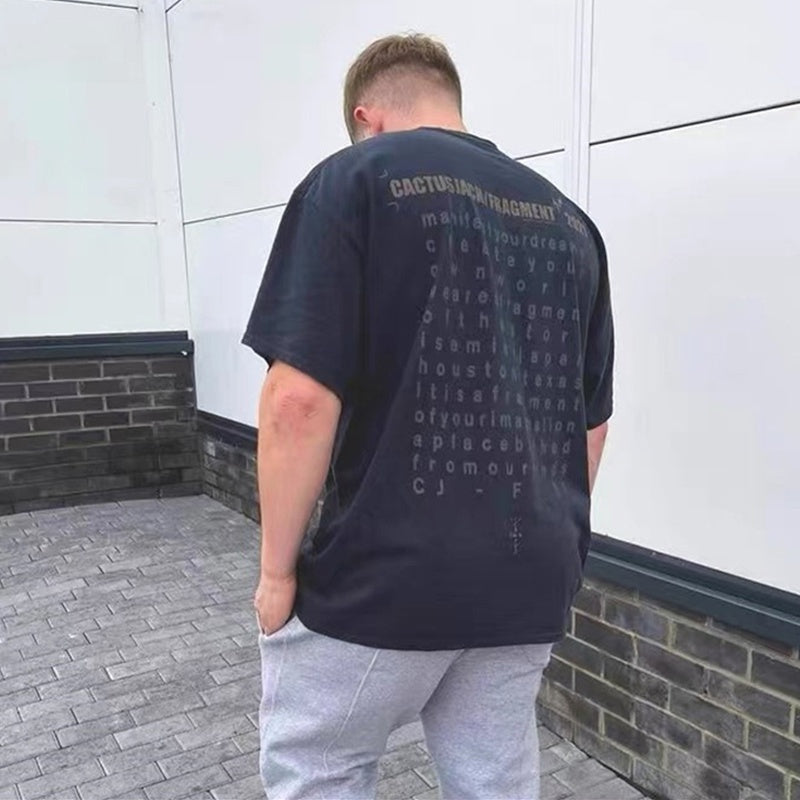 Mens T-shirt Vintage Kanye x Cactus Jack collaboration featuring Hiroshi Fujiwara's "Fragment" lightning bolt graphic.