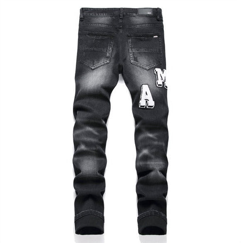 AMIRI Jeans Ripped Stretch Jeans