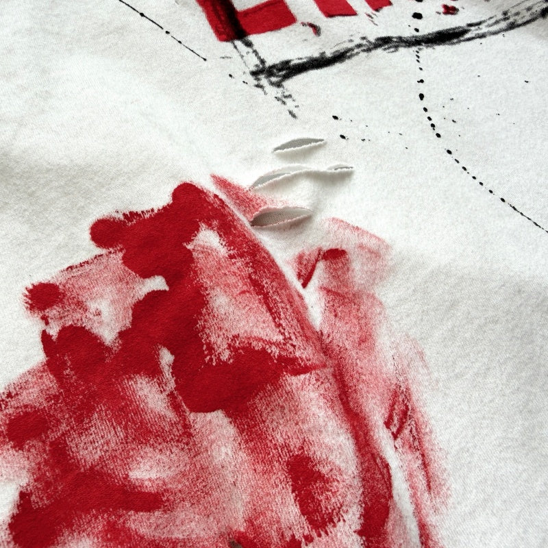 Unisex Vintage T Shirts Saint Street "Dirty" — An Unconventional Limited Edition. Street-graffiti style T-shirt featuring hand-painted splatter effects, multi-location hand-distressing, and a heavy-weight fabric treated with an enzyme-stone wash and
