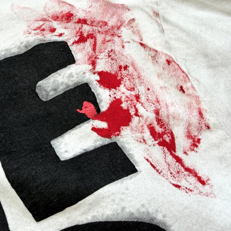 Unisex Vintage T Shirts Saint Street "Dirty" — An Unconventional Limited Edition. Street-graffiti style T-shirt featuring hand-painted splatter effects, multi-location hand-distressing, and a heavy-weight fabric treated with an enzyme-stone wash and
