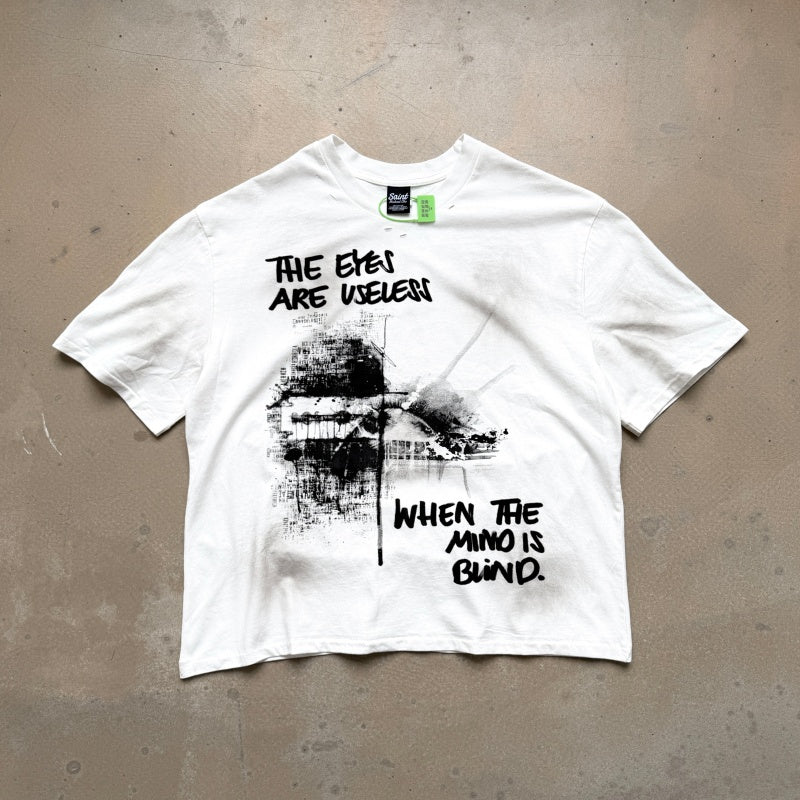 Unisex Vintage T Shirts Saint Street "Dirty" — A "Follow Your Heart" limited-edition tee featuring street graffiti aesthetics. Details include hand-painted "dirty" spray effects, multiple hand-distressed slash cuts, and a heavy-duty enzyme-washed fin