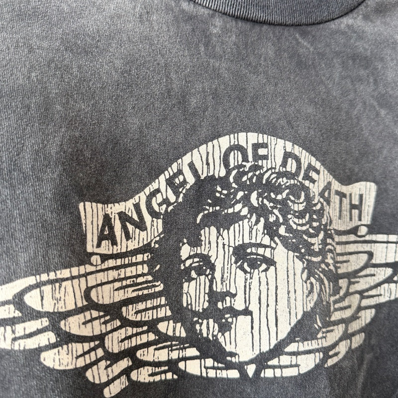 Unisex Vintage T Shirts Saint x Death Angel "Little Angel" Limited Edition. Crafted from heavyweight 100% cotton fabric (weighing 260g post-wash). Features vintage single-stitch construction (top and bottom hems), heavy-duty potassium spray and enzym