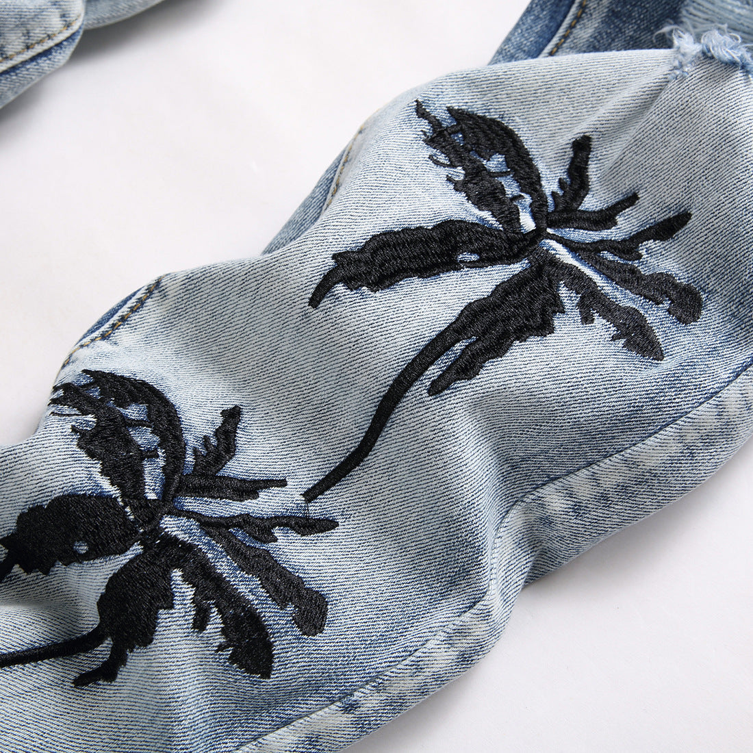 AM Jeans Ripped Stretch Jeans