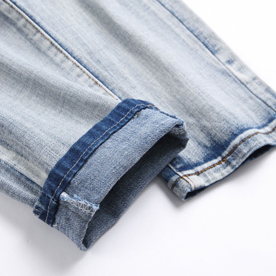 AM Jeans Ripped Stretch Jeans