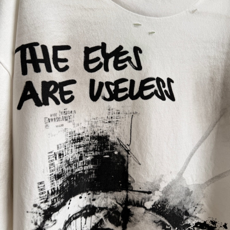 Unisex Vintage T Shirts Saint Street "Dirty" — A "Follow Your Heart" limited-edition tee featuring street graffiti aesthetics. Details include hand-painted "dirty" spray effects, multiple hand-distressed slash cuts, and a heavy-duty enzyme-washed fin