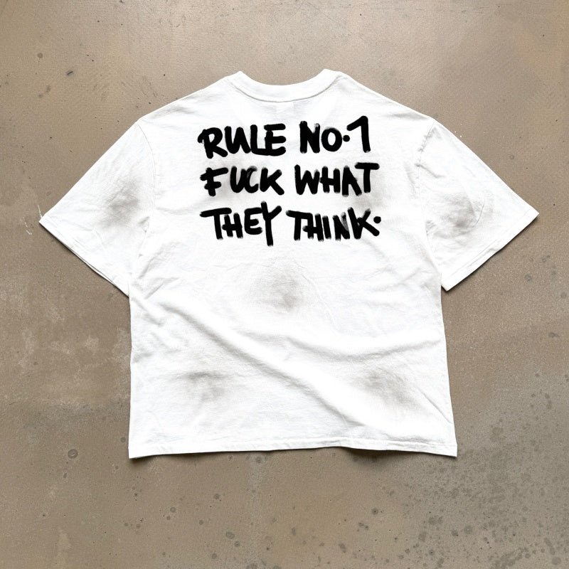 Unisex Vintage T Shirts Saint Street "Dirty" — A "Follow Your Heart" limited-edition tee featuring street graffiti aesthetics. Details include hand-painted "dirty" spray effects, multiple hand-distressed slash cuts, and a heavy-duty enzyme-washed fin