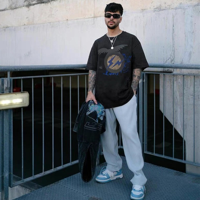 Mens T-shirt Vintage Kanye x Cactus Jack collaboration featuring Hiroshi Fujiwara's "Fragment" lightning bolt graphic.