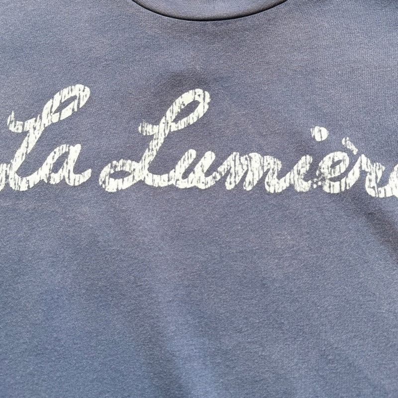 Unisex Vintage T Shirts SAINT MICHAEL "La Lumière" (French for "The Light") Limited Edition. Features heavyweight 320g fabric (post-wash weight) that matches the original specifications, along with vintage-style single-stitch and "blind stitch" (top-