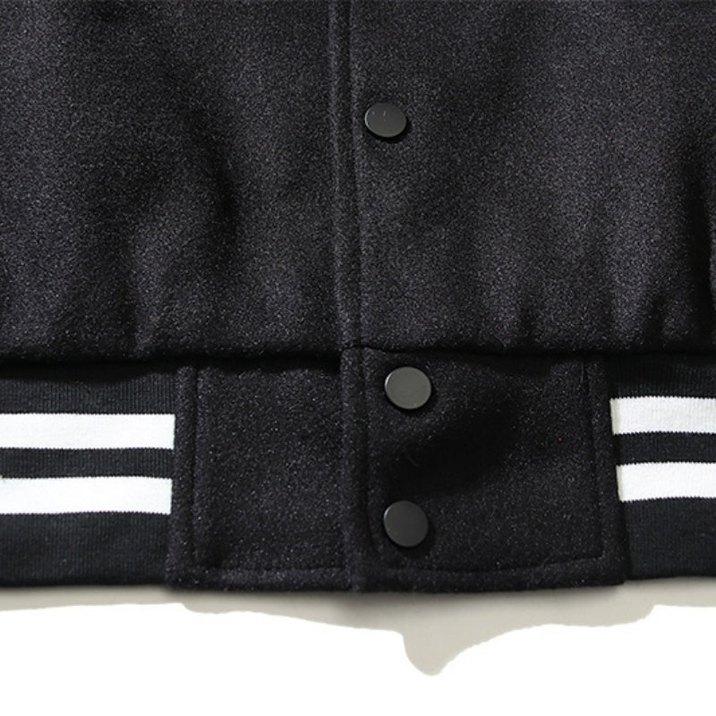 American-style baseball jacket High-street "Saint of God" American-style color-block varsity jacket for men; loose-fit unisex design featuring leather sleeves and a wool-blend body.