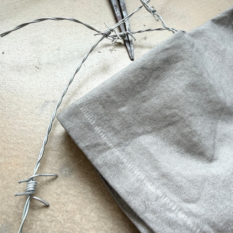Unisex Vintage T Shirts "Don't Cry, the Game Isn't Over Yet" Limited Edition Heavyweight Washed T-Shirt — Features "Heaven & Earth" stitching and single-needle construction, a specialized garment-dyed enzyme/abrasion wash process, a