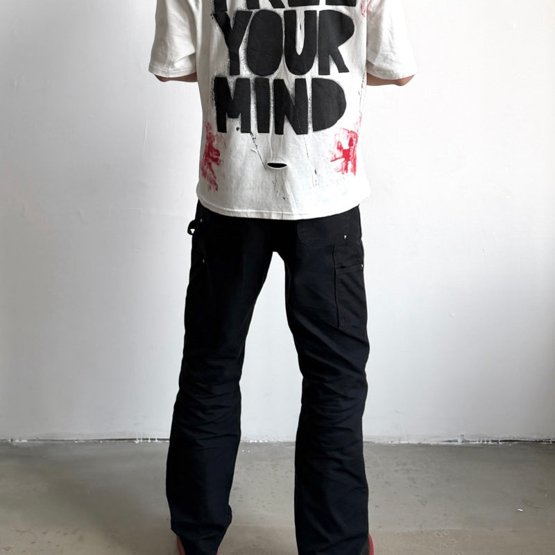 Unisex Vintage T Shirts Saint Street "Dirty" — An Unconventional Limited Edition. Street-graffiti style T-shirt featuring hand-painted splatter effects, multi-location hand-distressing, and a heavy-weight fabric treated with an enzyme-stone wash and