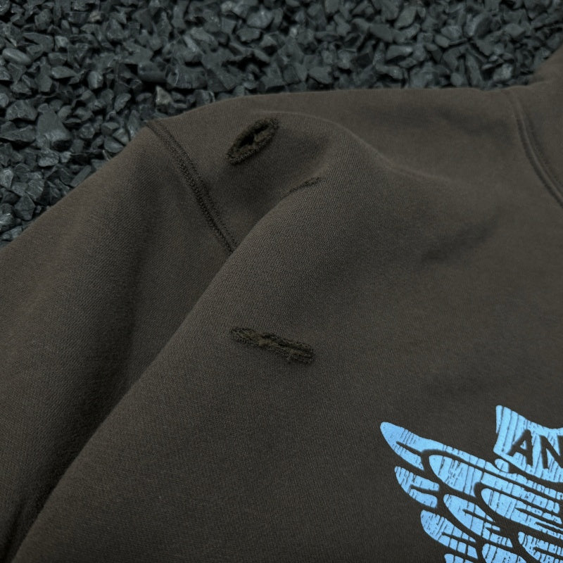 Unisex Vintage Hoodie"Little Angel Exclusive" – Vintage American-style hooded sweatshirt featuring a washed, distressed finish, handcrafted distressing details, a brushed texture, and a fleece-lined interior.